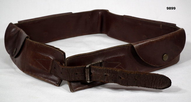 Brown leather money belt with pockets.
