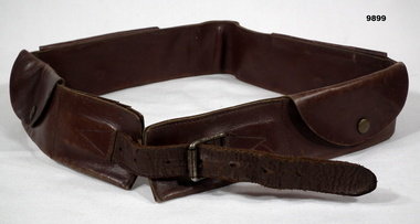 Brown leather money belt with pockets.