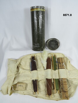 Survival Fishing kit with four lines and with hooks and sinkers.