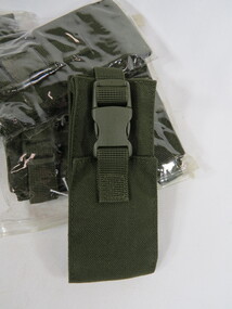 Small army green magazine pouch for a pistol magazine.