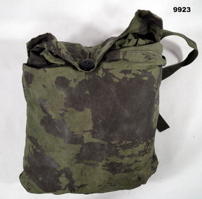 Plastic camouflage raincoat in pouch.