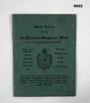 Green covered booklet with text in black type.