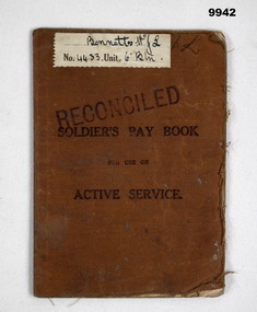 Brown buckram covered book with pay details.