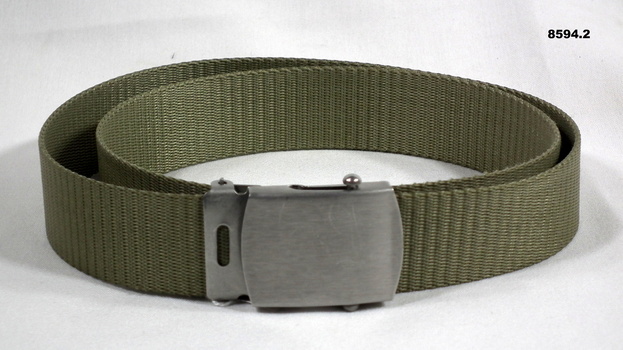 Belt - nylon green webbing with silver buckle.