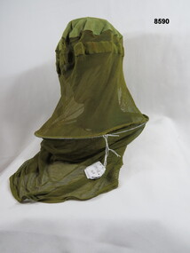 Green face cover, full insect screen.