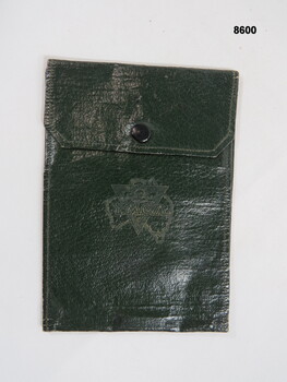 Green waterproof wallet branded YMCA.
