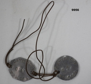 Two dog tags from WW2.