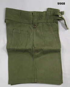 Uniform - Army green starched shorts.