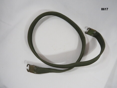 Green webbing rifle sling.