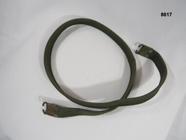 Green webbing rifle sling.