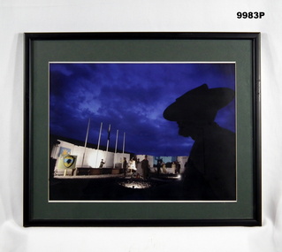 Framed photograph of a War Memorial.