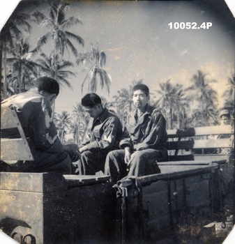 Japanese POW's in back of a truck.