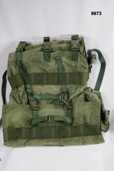 Green back pack with webbing straps, 65 pattern