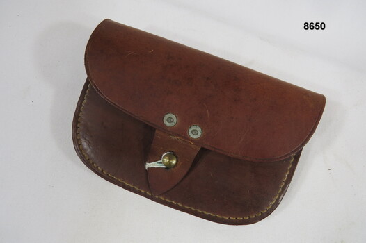 Small personal utility leather pouch.