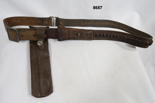 Leather ammunition belt for small arms.