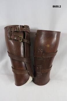 One pair of tan leather gaiters.
