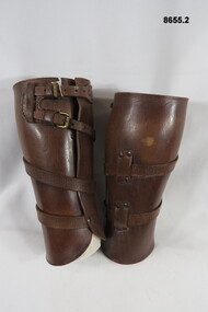 One pair of tan leather gaiters.