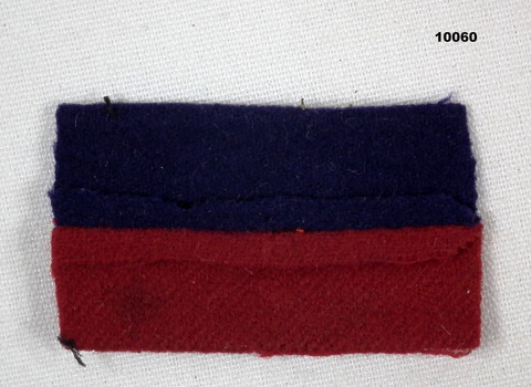 Red and dark purple colour patch.