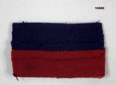 Red and dark purple colour patch.