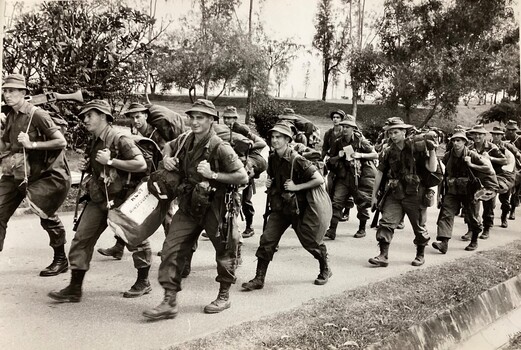 Group of soldiers loaded up with gear.