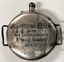 Text on the rear of the watch.