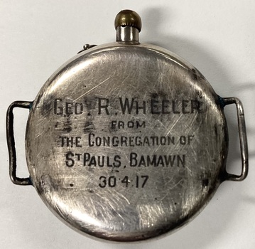 Text on the rear of the watch.