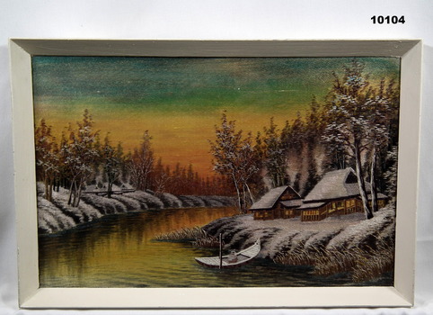 Silk picture featuring a cabin adjacent to a river.