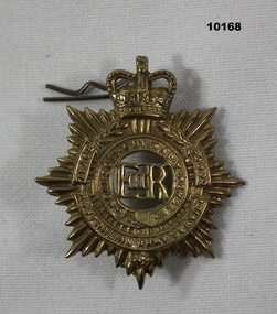 Gold coloured RAASC hat badge.