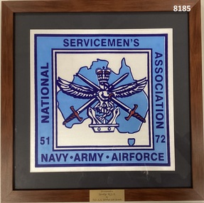 National Servicemen's Association logo framed.