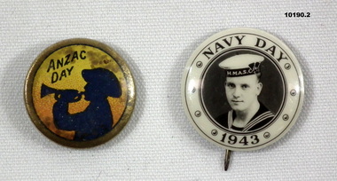 Two round commemorative badges - ANZAC Day and Navy Day.