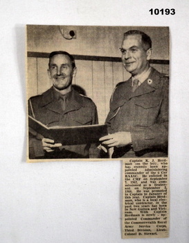 Newspaper article featuring photograph and text about Capt. K.J. Herdman.
