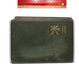 Photographic album dating from 1920's Images are fixed into card, and have no identifying information