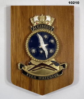 Wooden plaque with HMAS Albatross insignia.