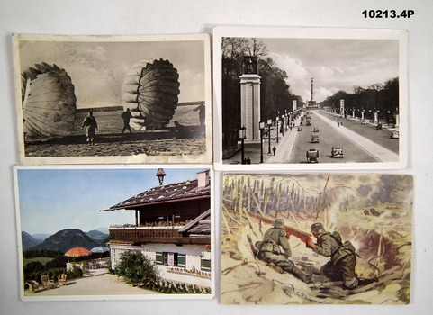 Four photographic German postcards.