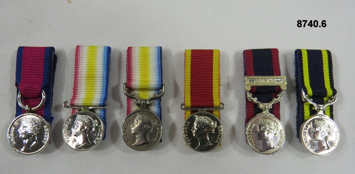 Set of six (6) miniature medals.