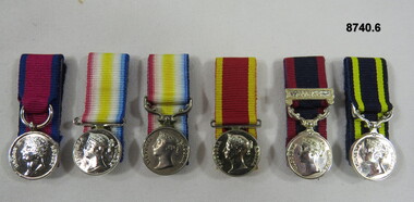 Set of six (6) miniature medals.