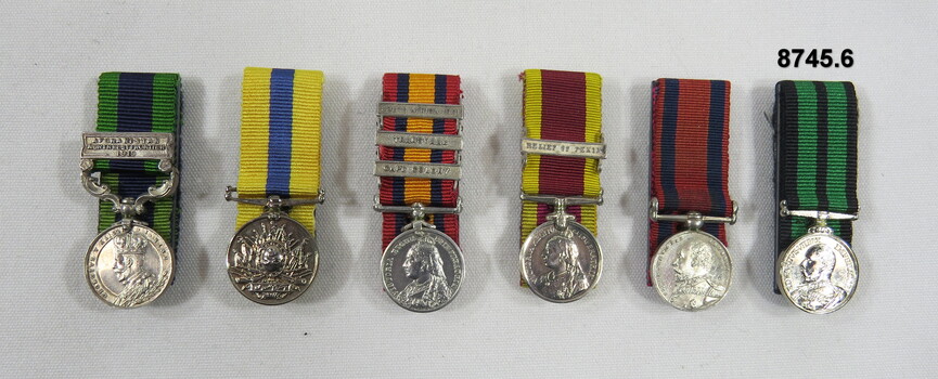Set of six (6) miniature medals.