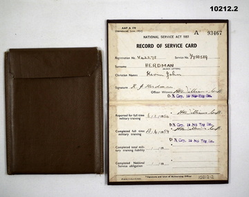 Record of service card/folder in brown coloured fabric folder.
