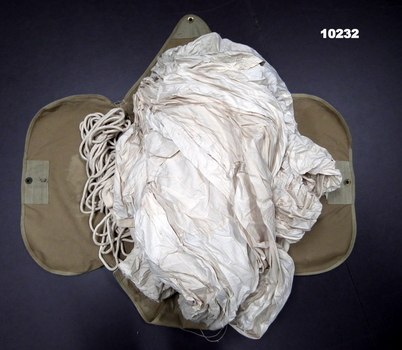 White cargo parachute and bag.