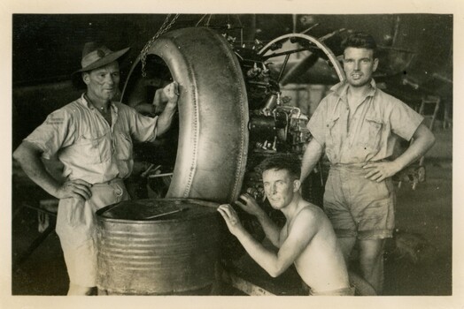 RAAF 462 Squadron groundcrew working on engine