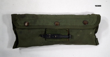 Cleaning kit in green Cordura fabric for M16 Rifle.