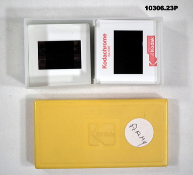 Plastic box containing twenty one colour slides featuring the Army.