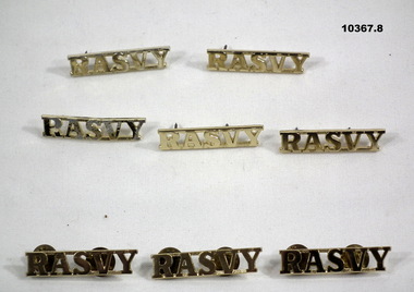Army uniform - eight shoulder badges.