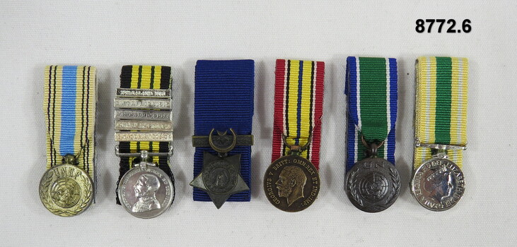 Set of six (6) miniature medals.