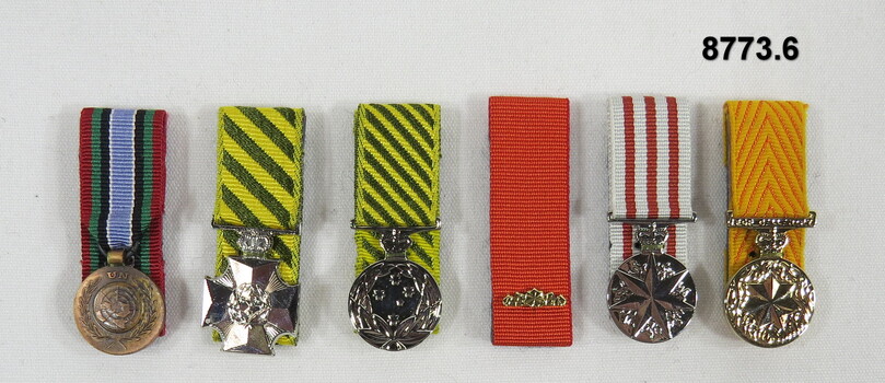 Set of six (6) miniature medals.