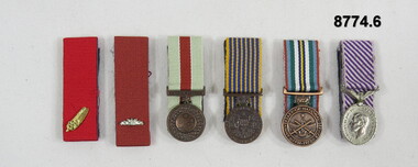 Set of six (6) miniature medals.
