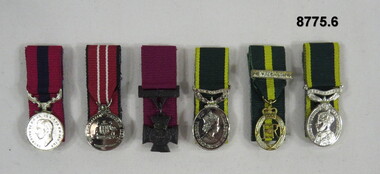 Set of six (6) miniature medals.