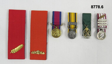 Set of six (6) miniature medals.