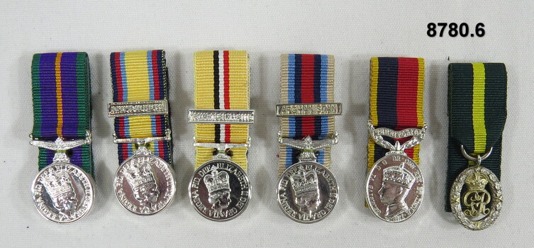 Se of six (6) miniature medals.