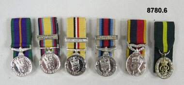 Se of six (6) miniature medals.